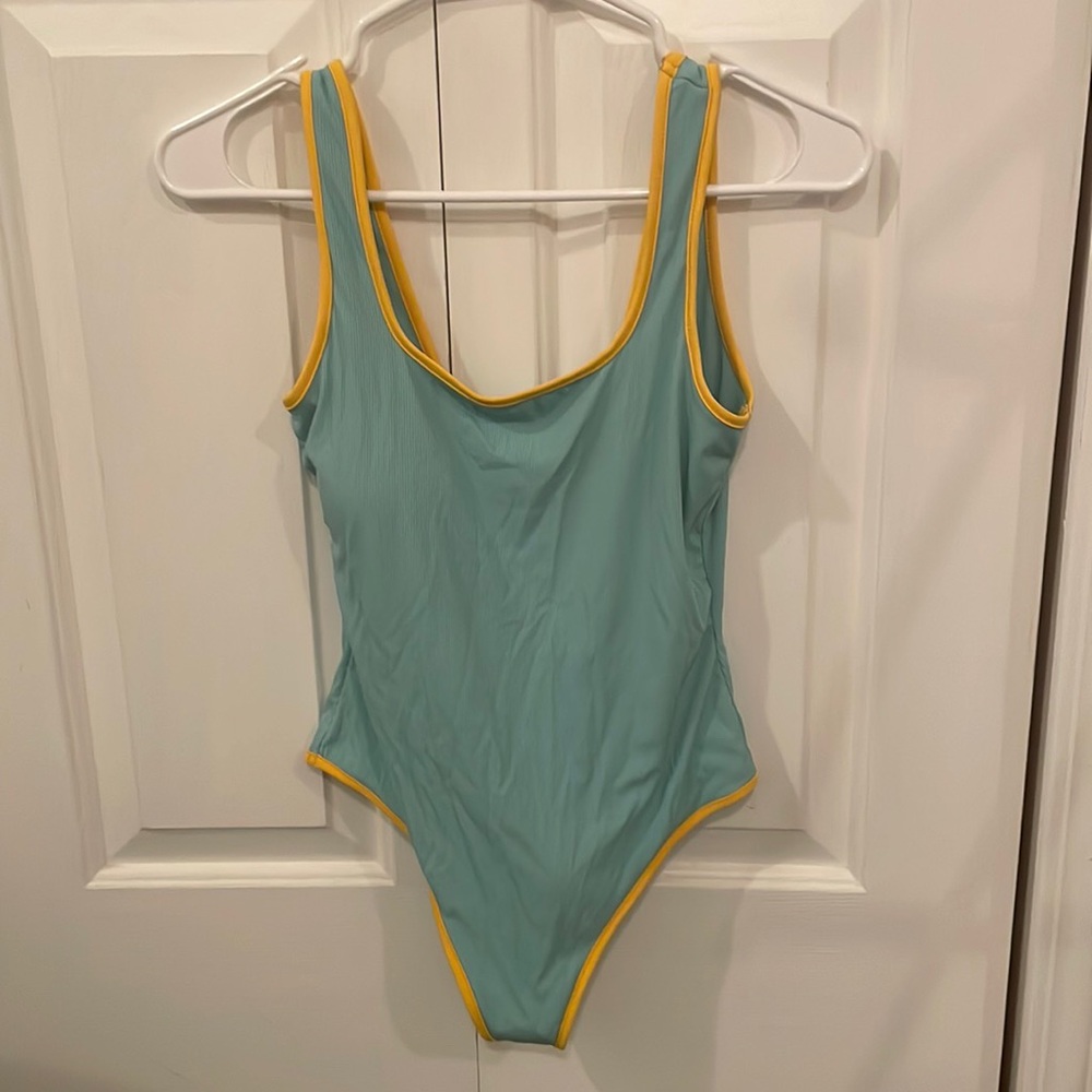 Kittenish one piece swimsuit